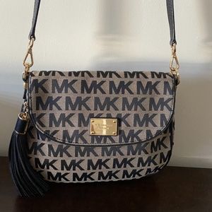 Black MK crossbody purse with wallet